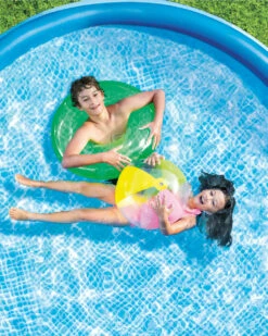 Easy Set® 10' X 24" Inflatable Pool W/ Filter Pump -INTEXCORP Shop Easy Set D01 lifestyle 2000x2500 9ccac2e 12622.1687813744